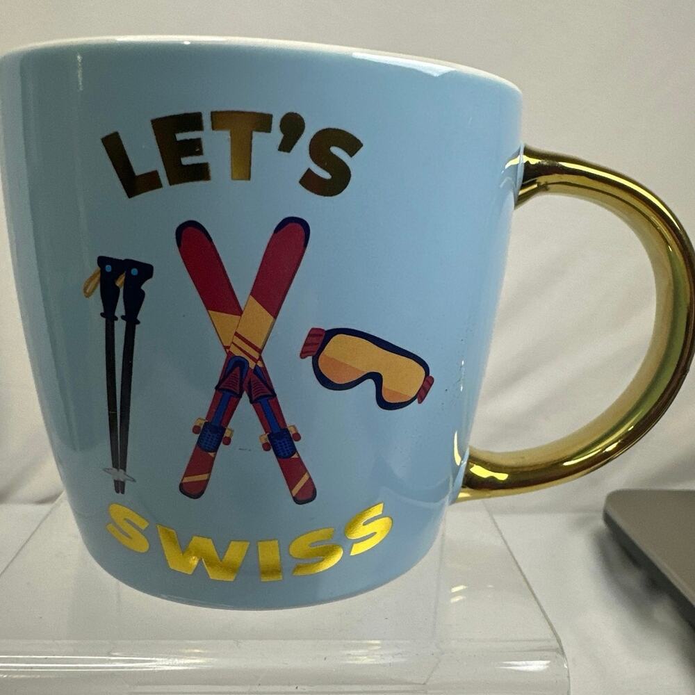 Lets Swiss ceramic Mug with a gold handle for coffee/tea from Around the World